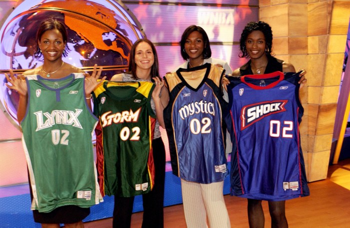 Tamika Williams, Sue Bird, Asjha Jones, and Swin Cash of the University of Connecticut pose for a group portrait at the WNBA Draft 2002 in Secaucus, New Jersey.