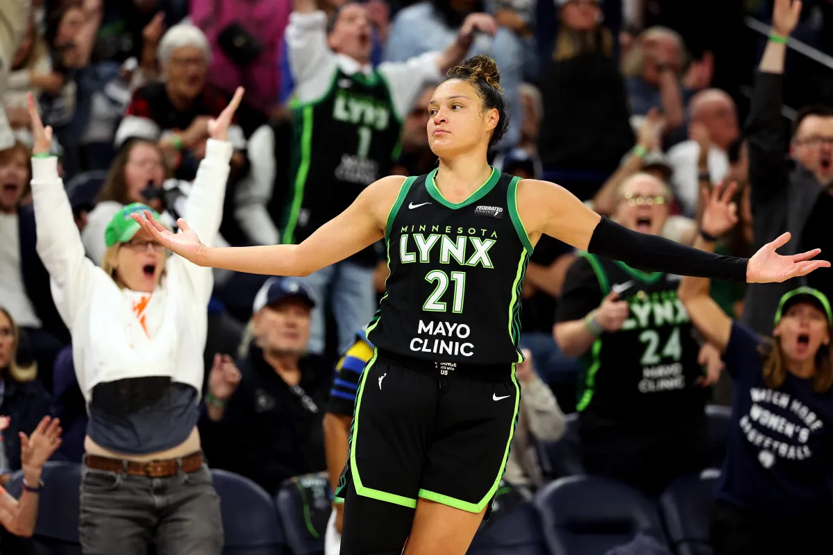 MINNEAPOLIS, MINNESOTA - OCTOBER 08: Kayla McBride #21 of the Minnesota Lynx celebrates her basket against the Connecticut Sun in the first quarter of Game Five of the Semi-Finals during the WNBA Playoffs at Target Center on October 08, 2024 in Minneapolis, Minnesota. 