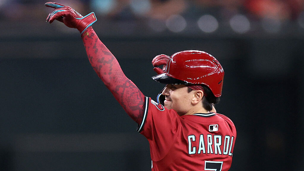 Corbin Carroll #7 of the Arizona Diamondbacks celebrates while rounding the bases after hitting a t...