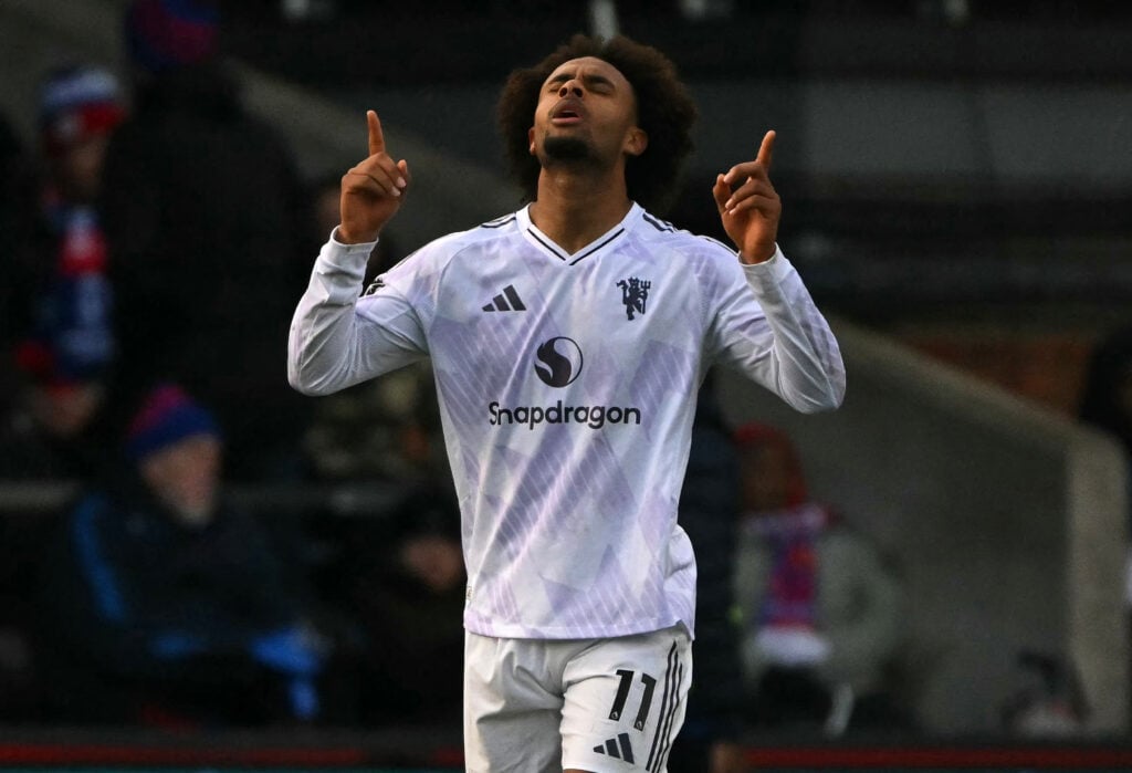 Joshua Zirkzee celebrates scoring for Manchester United.