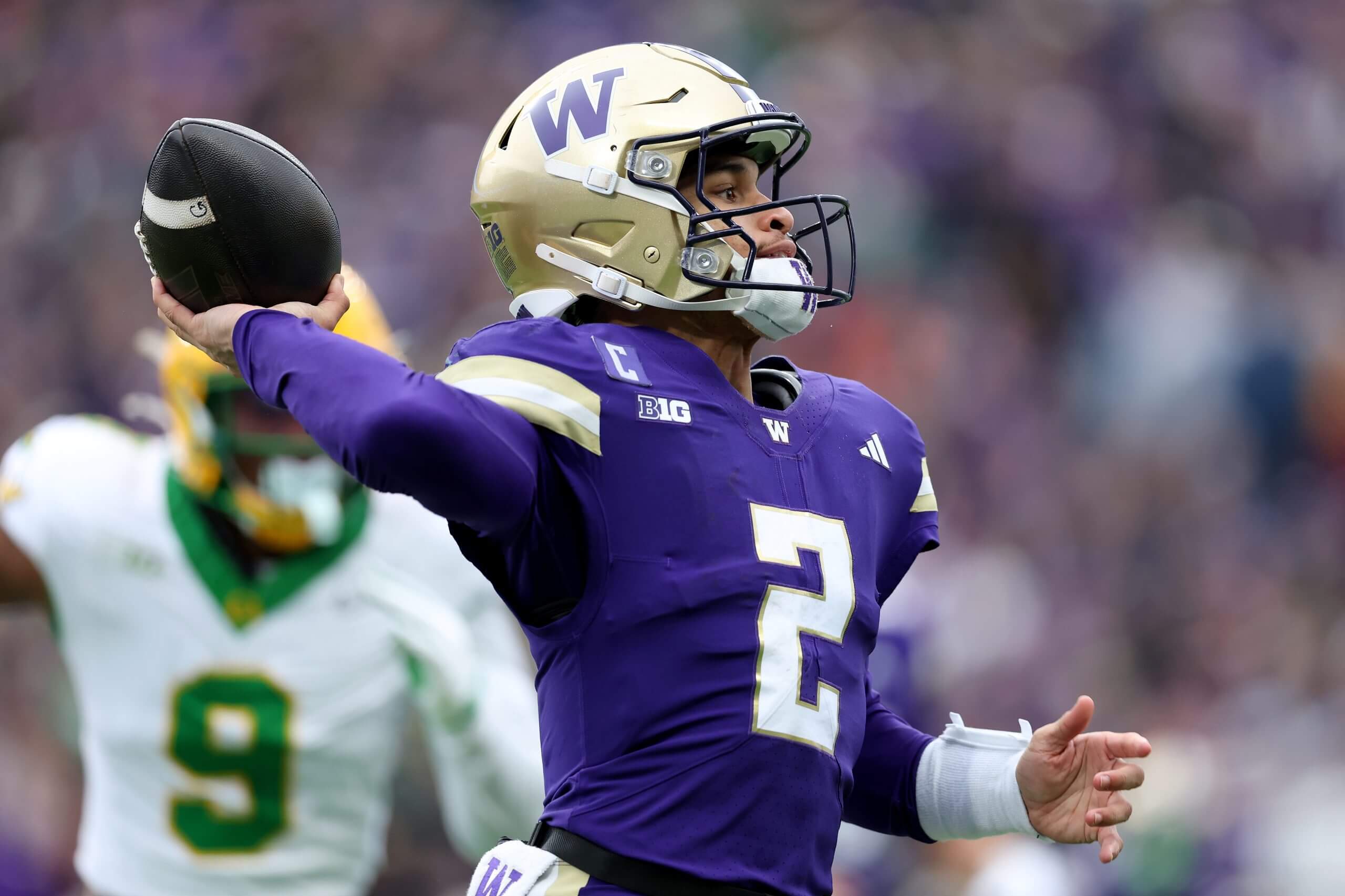 Washington quarterback Demond Williams gets ready to throw a pass