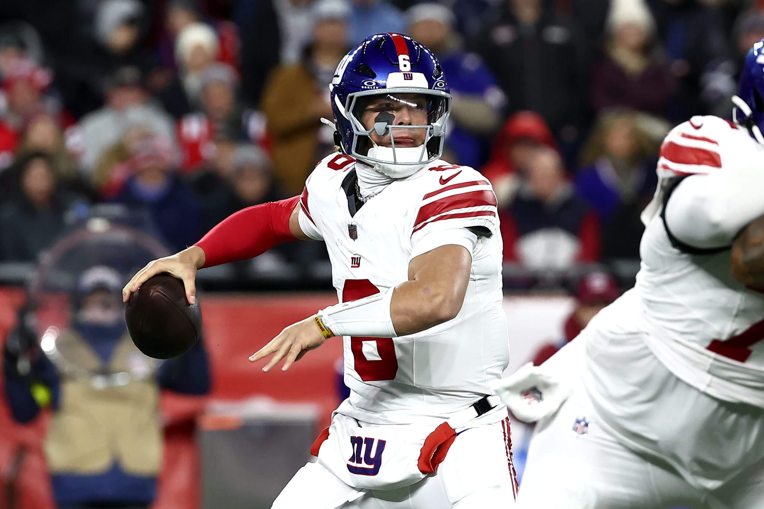 Jaxson Dart #6 of the New York Giants makes a pass during the first quarter of the game against the New England Patriots.