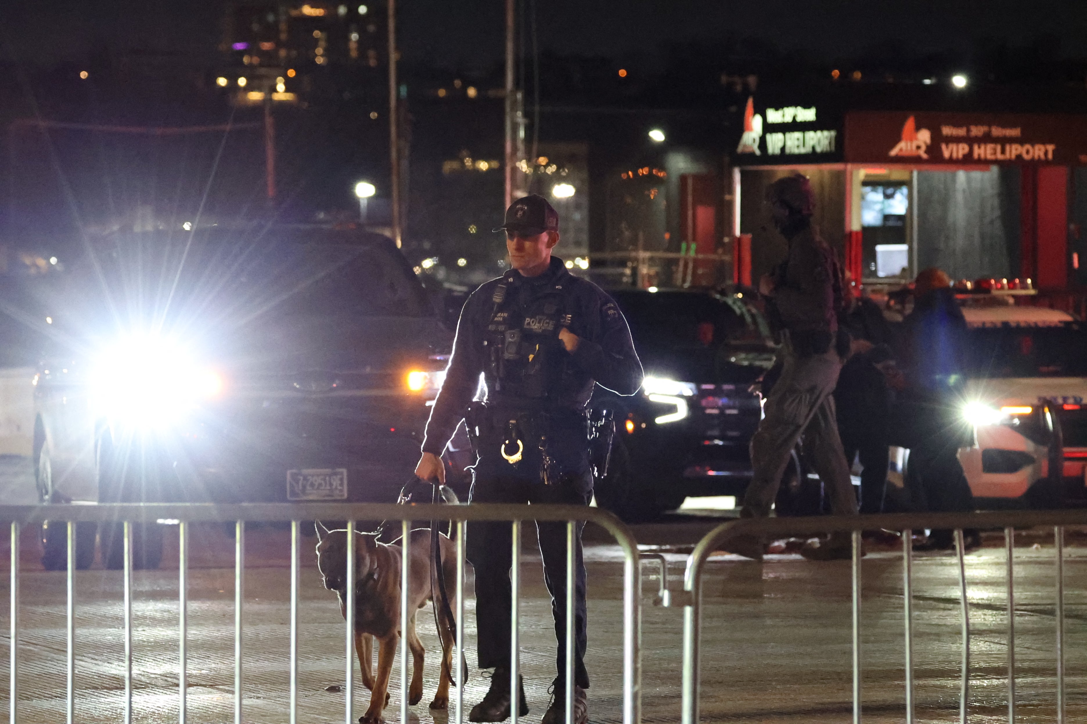 A policeman patrols at the Westside Heliport in New York ahead of the expected arrival of ousted Venezuelan President Nicolas Maduro