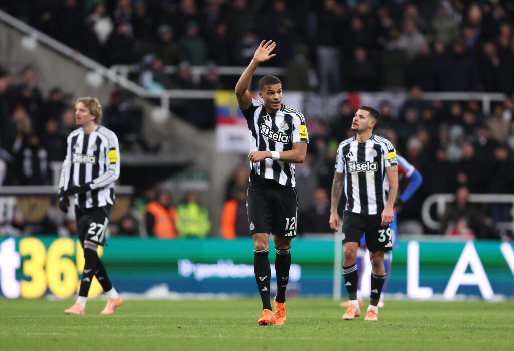 Malick Thiaw waves after scoring for Newcastle United against Crystal Palace.