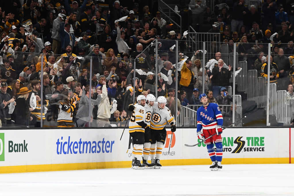 Jonathan Aspirot #45, Pavel Zacha #18 and Casey Mittelstadt #11 of the Boston Bruins celebrate the first-period goal against the New York Rangers at the TD Garden on January 10, 2026 in Boston, Massachusetts.
