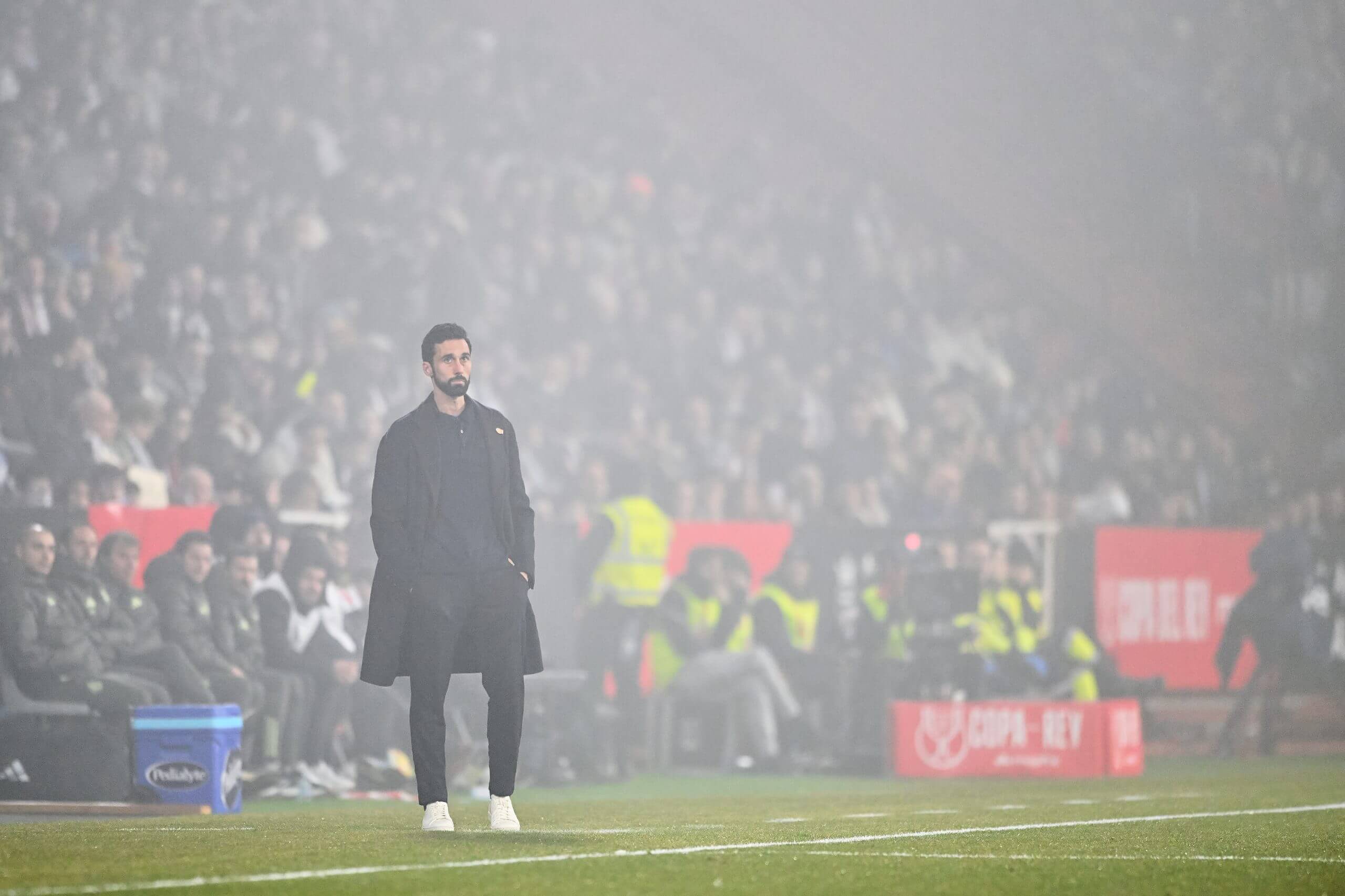 Arbeloa on the Real Madrid touchline in foggy conditions 