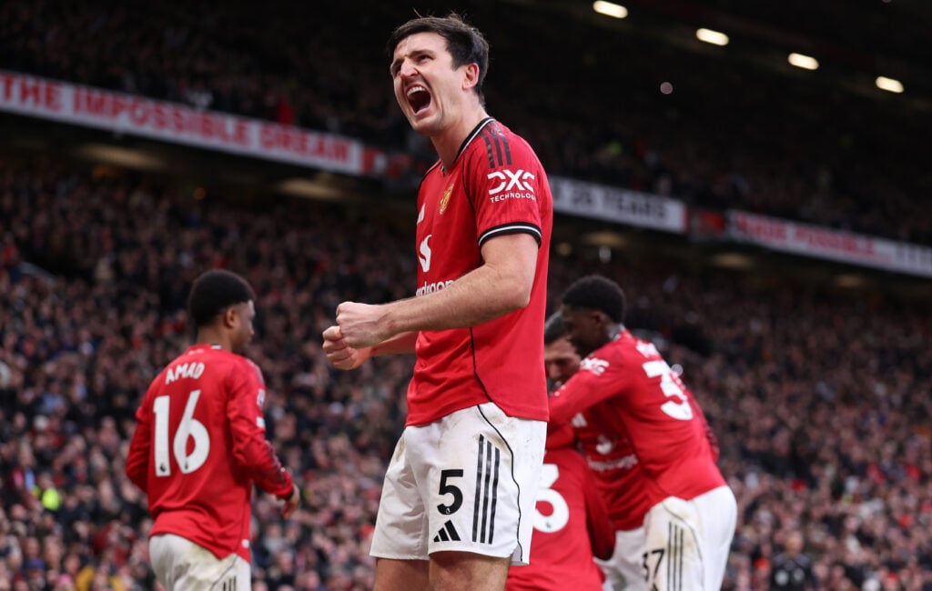 Harry Maguire celebrates during the Premier League match between Manchester United and Manchester City at Old Trafford in 2026 in Manchester, England.