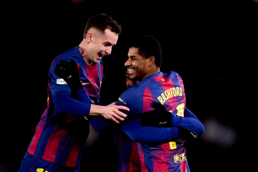 Marcus Rashford celebrates with Marc Casado