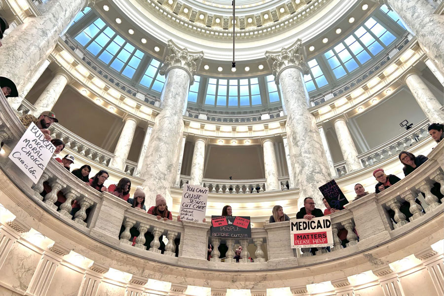 Hundreds of Idahoans gathered in the rotunda of the Idaho Capitol on Jan. 12, 2026, to protest budget cuts to the state’s Medicaid program. The protest, organized by Idaho Voices for Children, took place before the governor’s State of the State Address. (Photo by Christina Lords/Idaho Capital Sun)