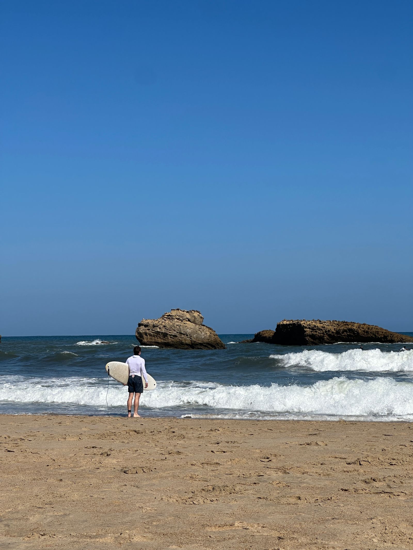 Image may contain Horizon Nature Outdoors Sky Person Sea Water Beachwear and Clothing