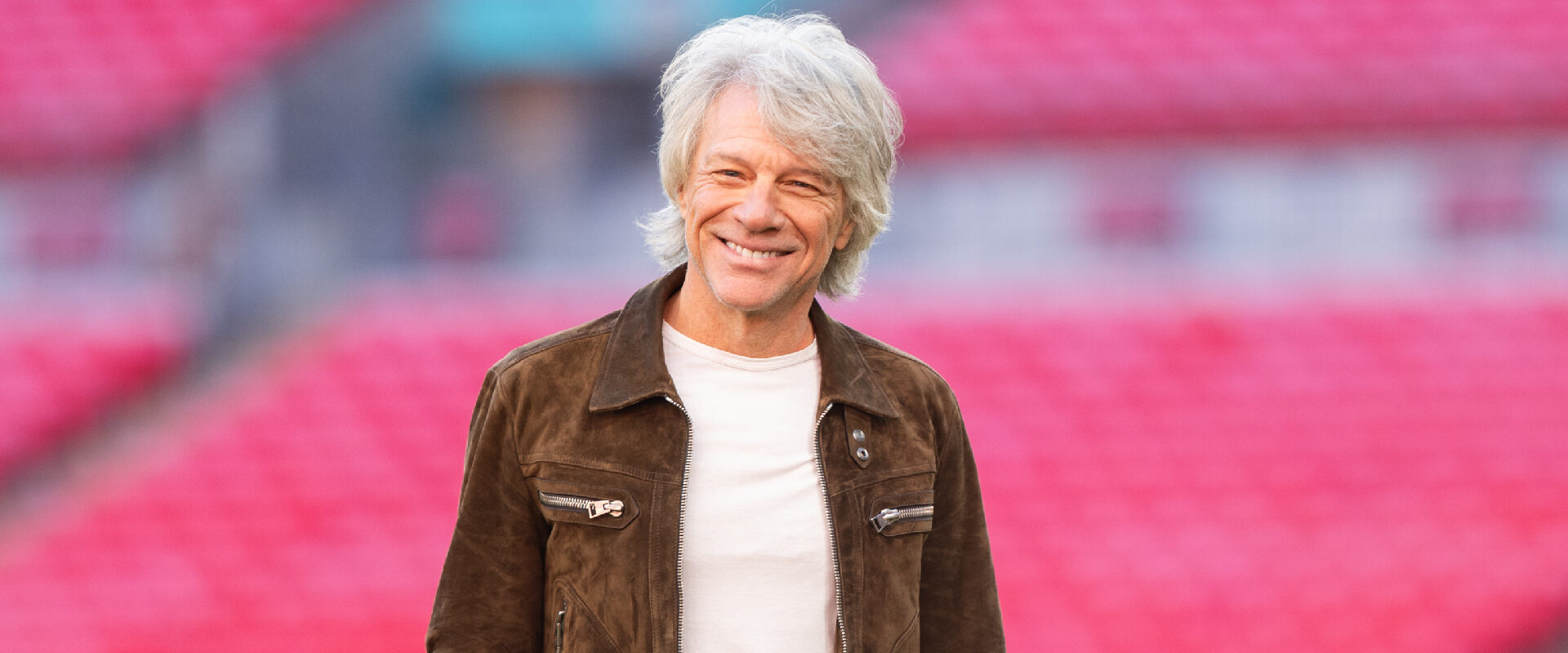 Watch Jon Bon Jovi Deliver a Vintage “Livin’ on a Prayer” at Tiger Woods’ 50th Birthday Party