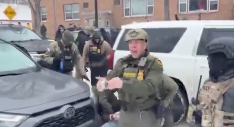 Biovino fumbles with the cannister's pin while warning he is about to deploy it.