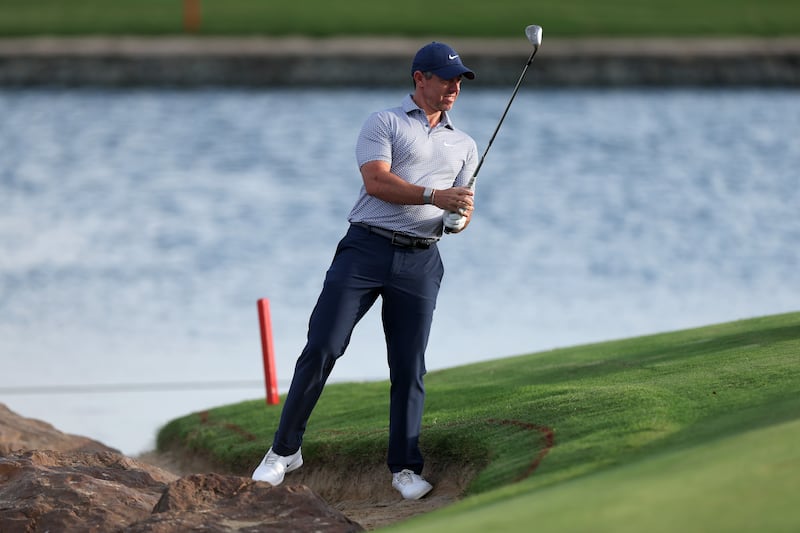 Rory McIlroy plays his third shot on the 18th on day two of the 2026 Dubai Invitational. Photograph: Andrew Redington/Getty Images