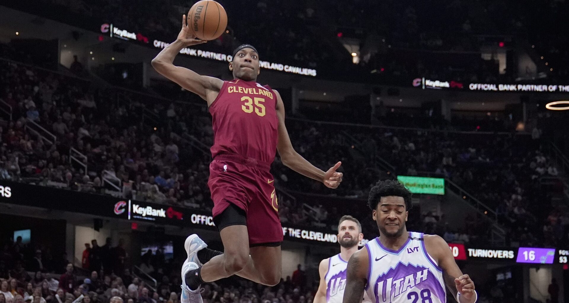 Nae'qwan Tomlin goes up for a dunk.