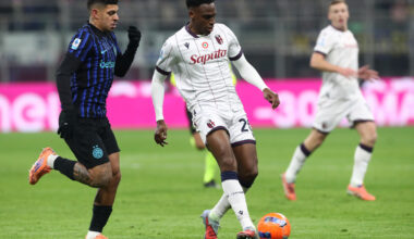 MILAN, ITALY - JANUARY 04: Jhon Lucumi of Bologna is challenged by Luis Henrique of FC Internazionale Milano during the Serie A match between FC Internazionale and Bologna FC 1909 at Giuseppe Meazza Stadium on January 04, 2026 in Milan, Italy. (Photo by Marco Luzzani/Getty Images)