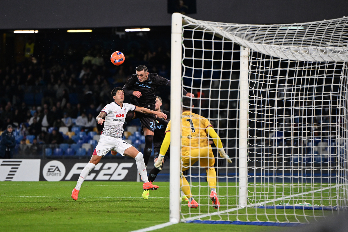 NAPLES, ITALY - DECEMBER 03: Lorenzo Lucca of SSC Napoli scores his team's first goal during the Coppa Italia round of 16 match between SCC Napoli and Cagliari Calcio at Stadio Diego Armando Maradona on December 03, 2025 in Naples, Italy. (Photo by Francesco Pecoraro/Getty Images)