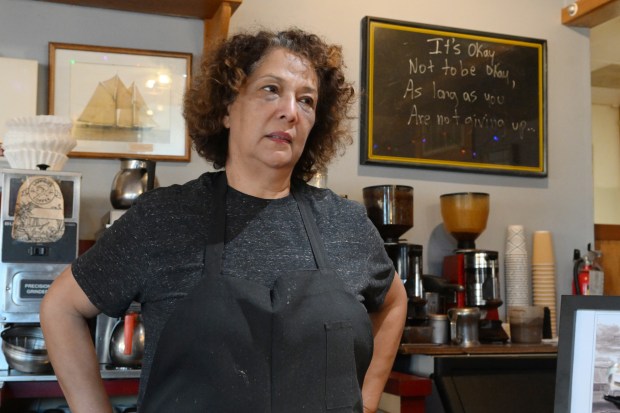 Regina Diaz, co-owner of Anchorage 5 restaurant, stands at the counter in Sausalito, Calif., on Thursday, Jan. 22, 2026. Water from king tides in early January made its way into the restaurant. (Alan Dep/Marin Independent Journal)