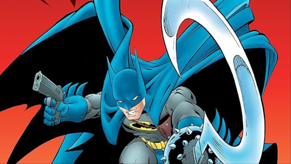 Batman holding a gun and a scythe blade