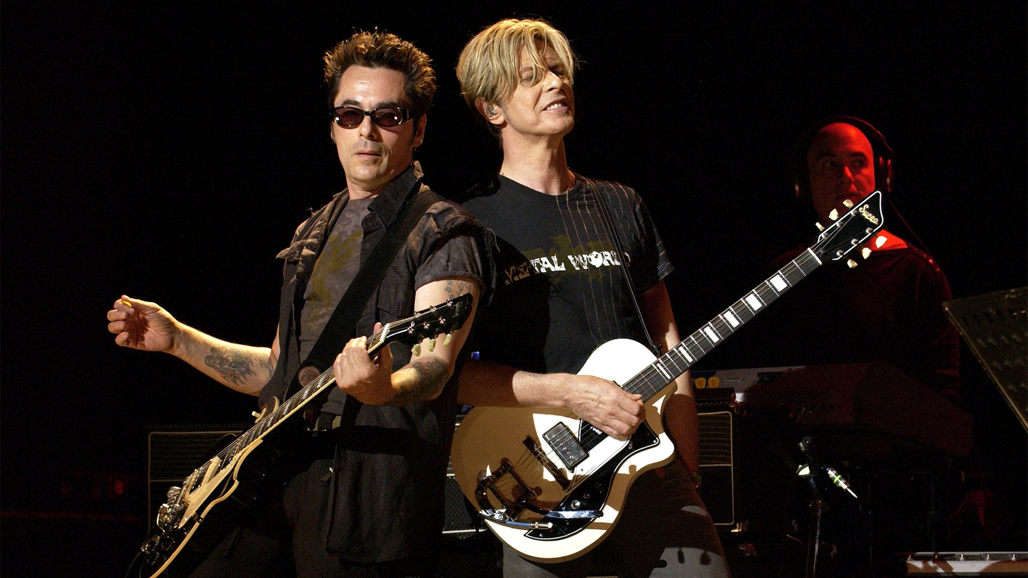 Earl Slick and David Bowie during David Bowie Gives Fans a Strong Dose of "A Reality Tour" at Special Poughkeepsie Warm Up Show For His Upcoming World Tour at The Chance Nghtclub in Poughkeepsie, New York, United States.