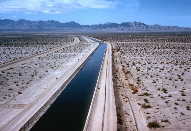 Water flows through the Southern California desert in an aqueduct supply channel. Some 75% of Southern California's water supply comes from the Colorado Aqueduct, built in the 1930s to transport water from the Colorado River to the region. (MWD of Southern California via AP)