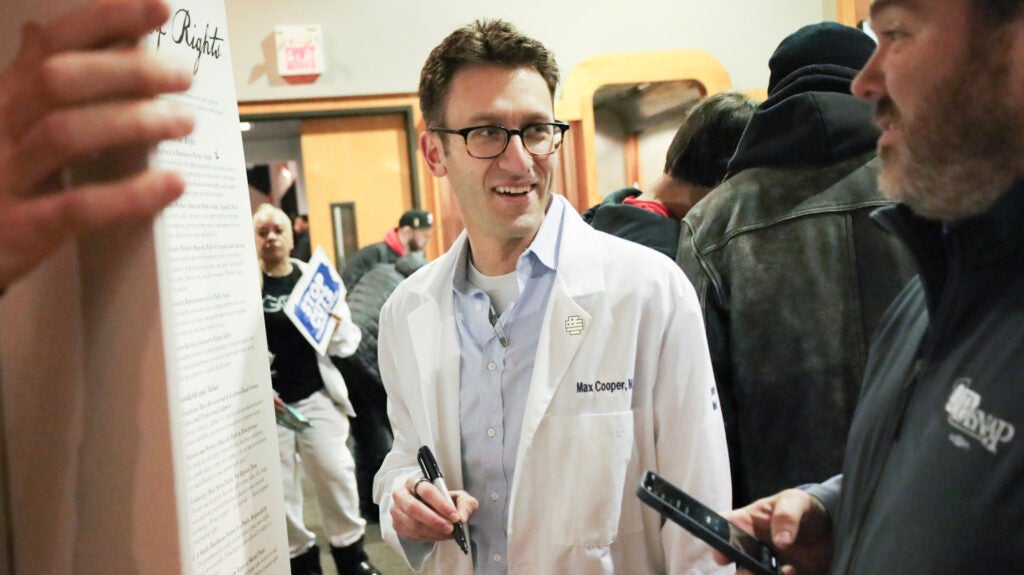 A former emergency medicine physician signs a "Healthcare Bill of Rights"