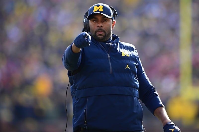 Michigan acting head coach Sherrone Moore reacts to a video replay during game against Ohio State, Saturday, Nov. 25, 2023, in Ann Arbor, Mich.
