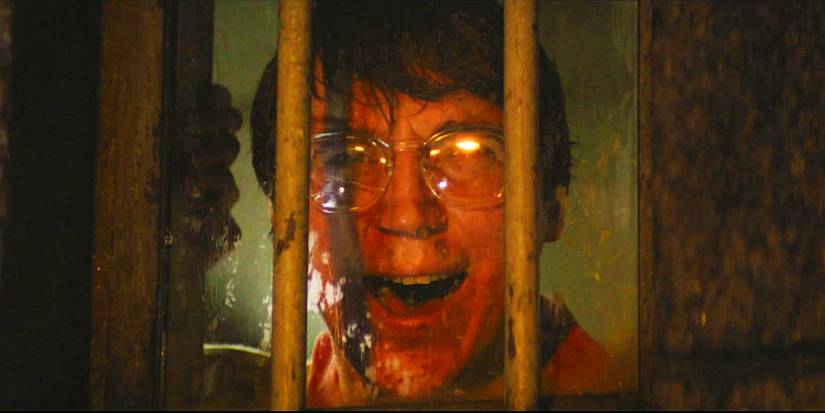 Paul Dano as the Riddler with his mouth open