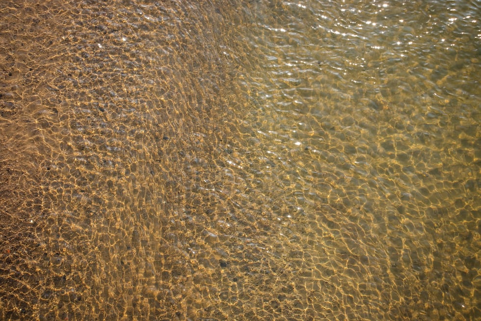 The water of the Mill Creek is so clear, people can see the bottom of the shallow body from...