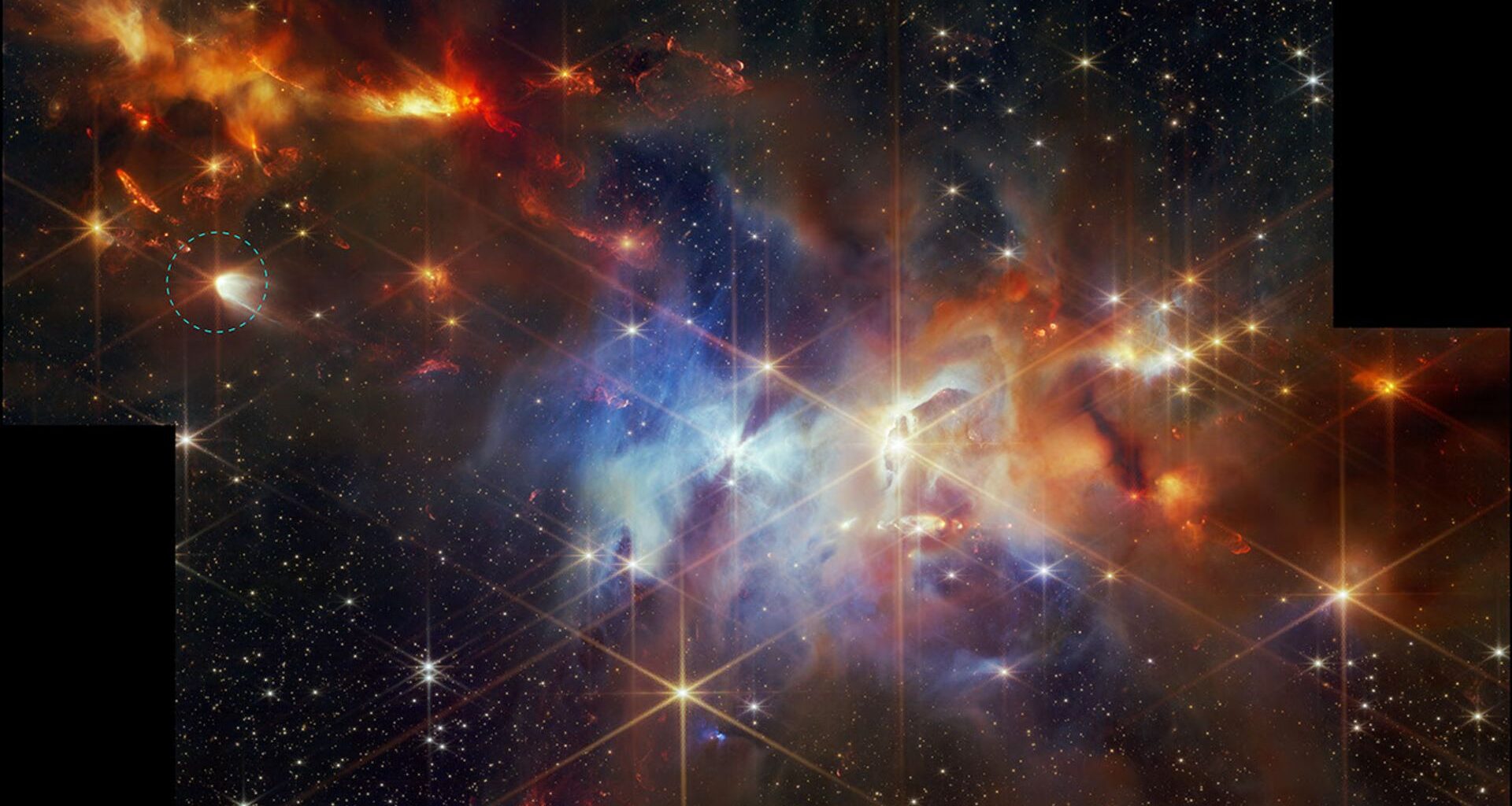 Glowing swirls of purple and orange gas mix with bright twinkly stars against a dark deep space background