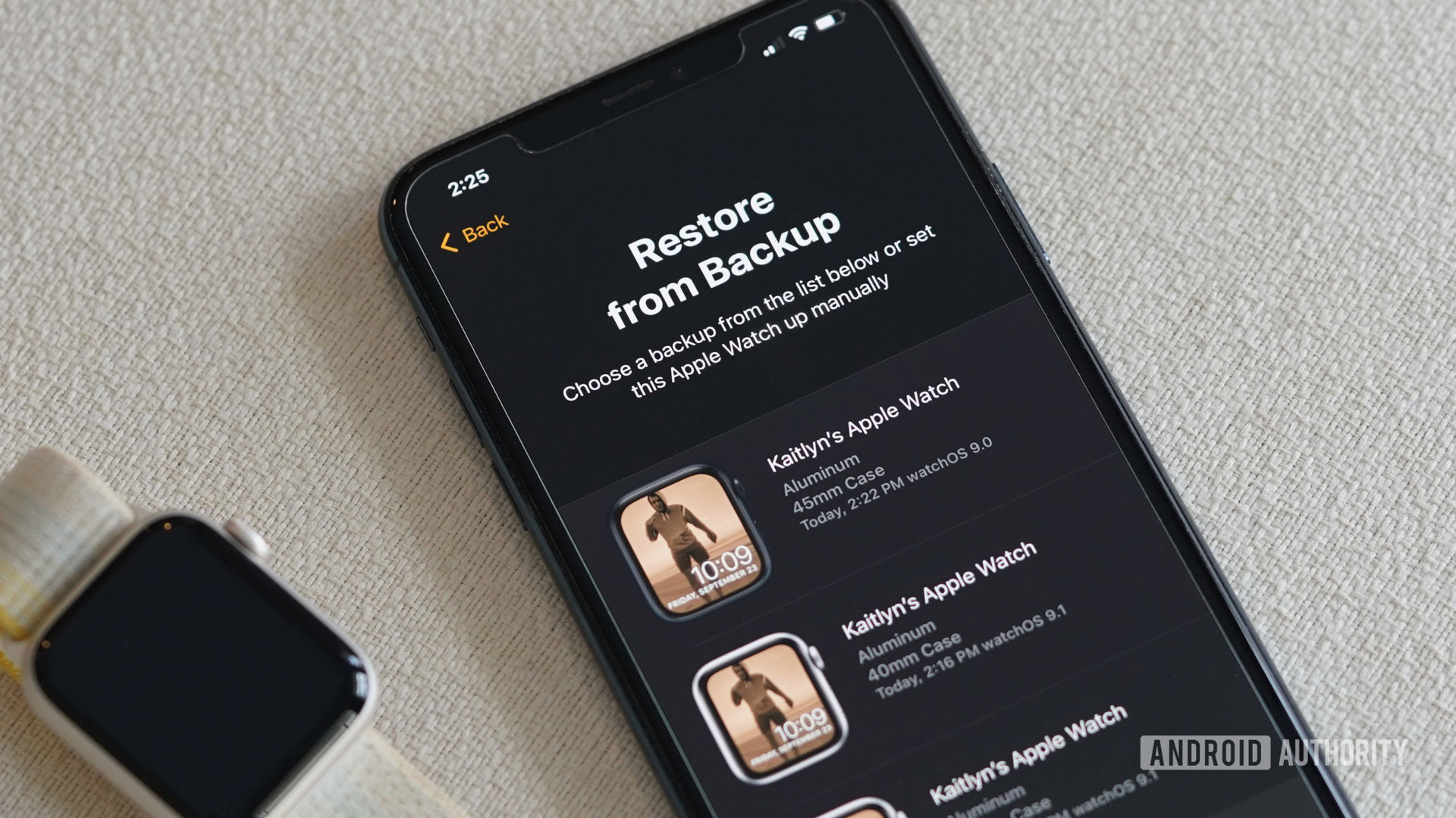 An Apple Watch user selects which backup to restore.