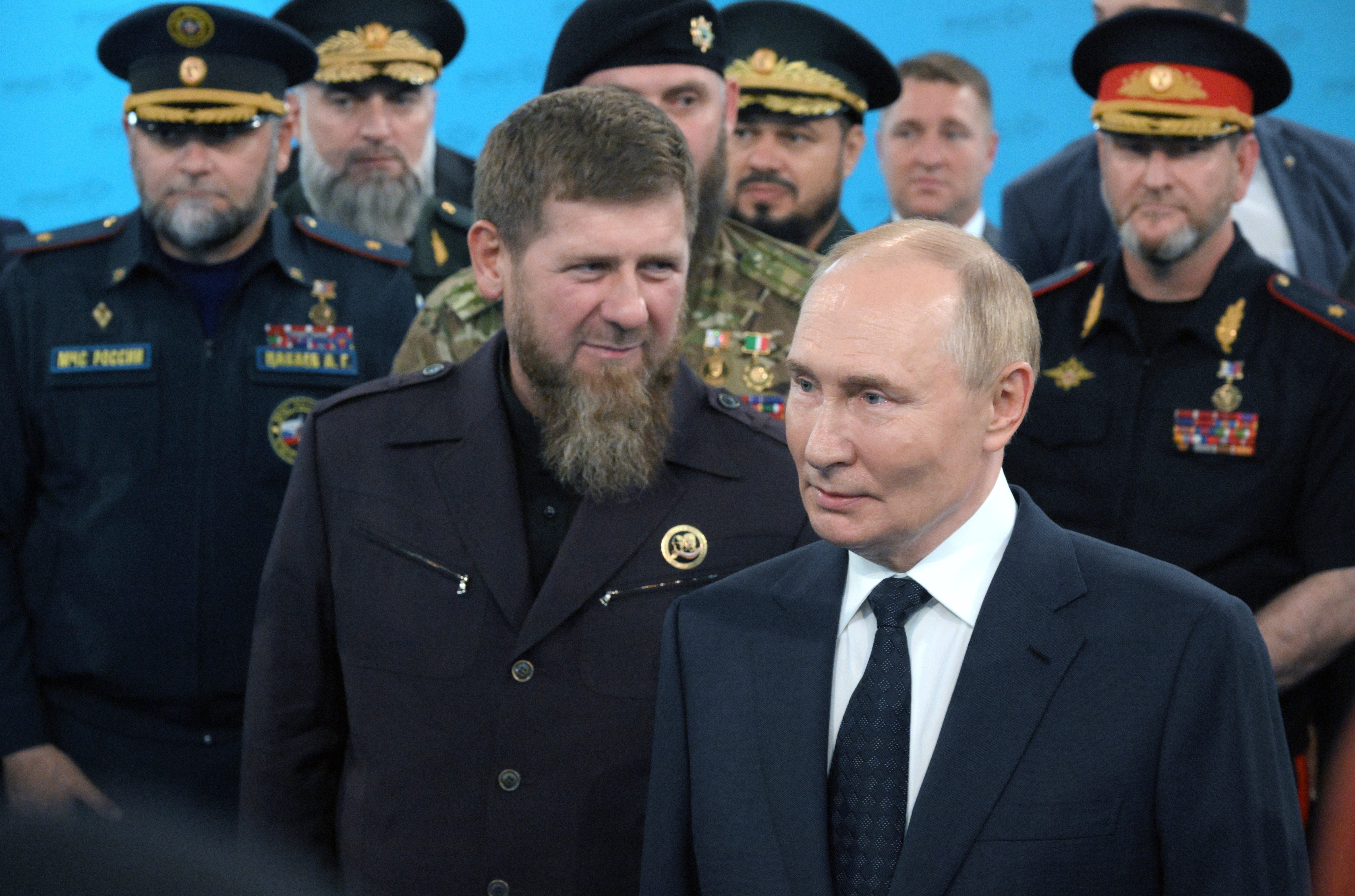 Russian president Vladimir Putin accompanied by Head of the Chechen Republic Ramzan Kadyrov talks to servicemen during his visit to the Special Forces University in Gudermes, Chechen Republic