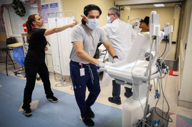 Medical personnel in the Emergency Room area at Scripps Mercy Hospital in Chula Vista on Monday, December 29, 2025. Hospitals are at risk of losing significant Medi-Cal reimbursement due to federal budget changes. (Sandy Huffaker / For The San Diego Union-Tribune)