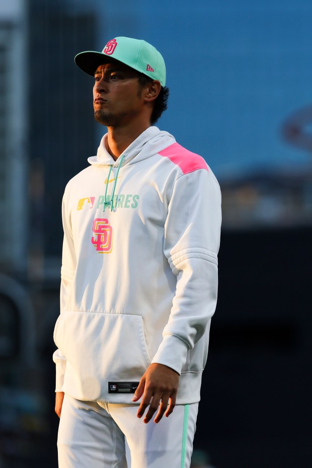 Yu Darvish #11 of the San Diego Padres walks towards the dugout before their game against the Colorado Rockies at Petco Park on Friday, Sept. 12, 2025 in San Diego, California. (Meg McLaughlin / The San Diego Union-Tribune)