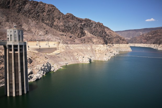 The "bathtub ring" around Lake Mead is seen near the Nevada intake tower at the Hoover Dam near Boulder City, Nevada, on June 25, 2024. (Photo by RJ Sangosti/The Denver Post)