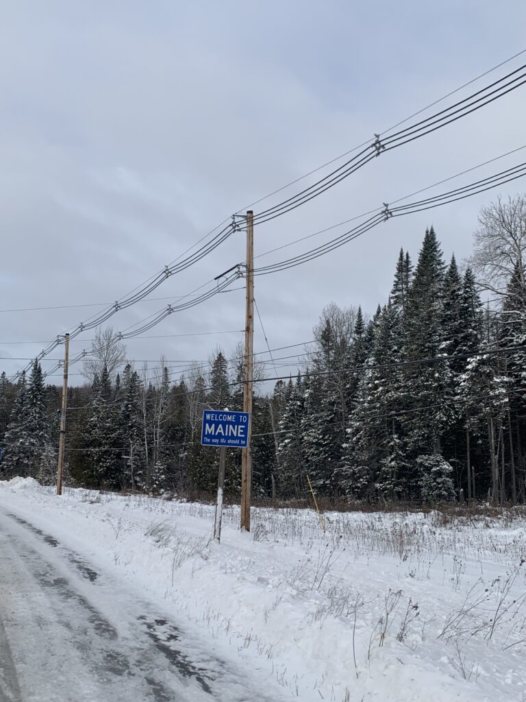 Transmission lines at Maine's border with Canada. Credit: Nathaniel Eisen/Inside Climate News