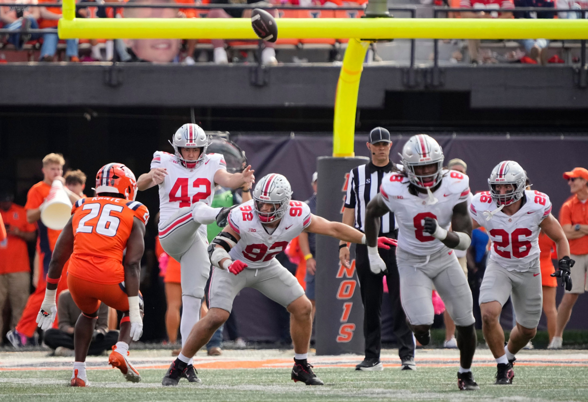 Ohio State Buckeyes punter Joe McGuire (42) punts during the second half of the NCAA football game against the Illinois Fighting Illini at Gies Memorial Stadium in Champaign on Oct. 11, 2025. Ohio State won 34-16. Ohio State Buckeyes punter Joe McGuire (42) punts during the second half of the NCAA football game against the Illinois Fighting Illini at Gies Memorial Stadium in Champaign on Oct. 11, 2025. Ohio State won 34-16.
