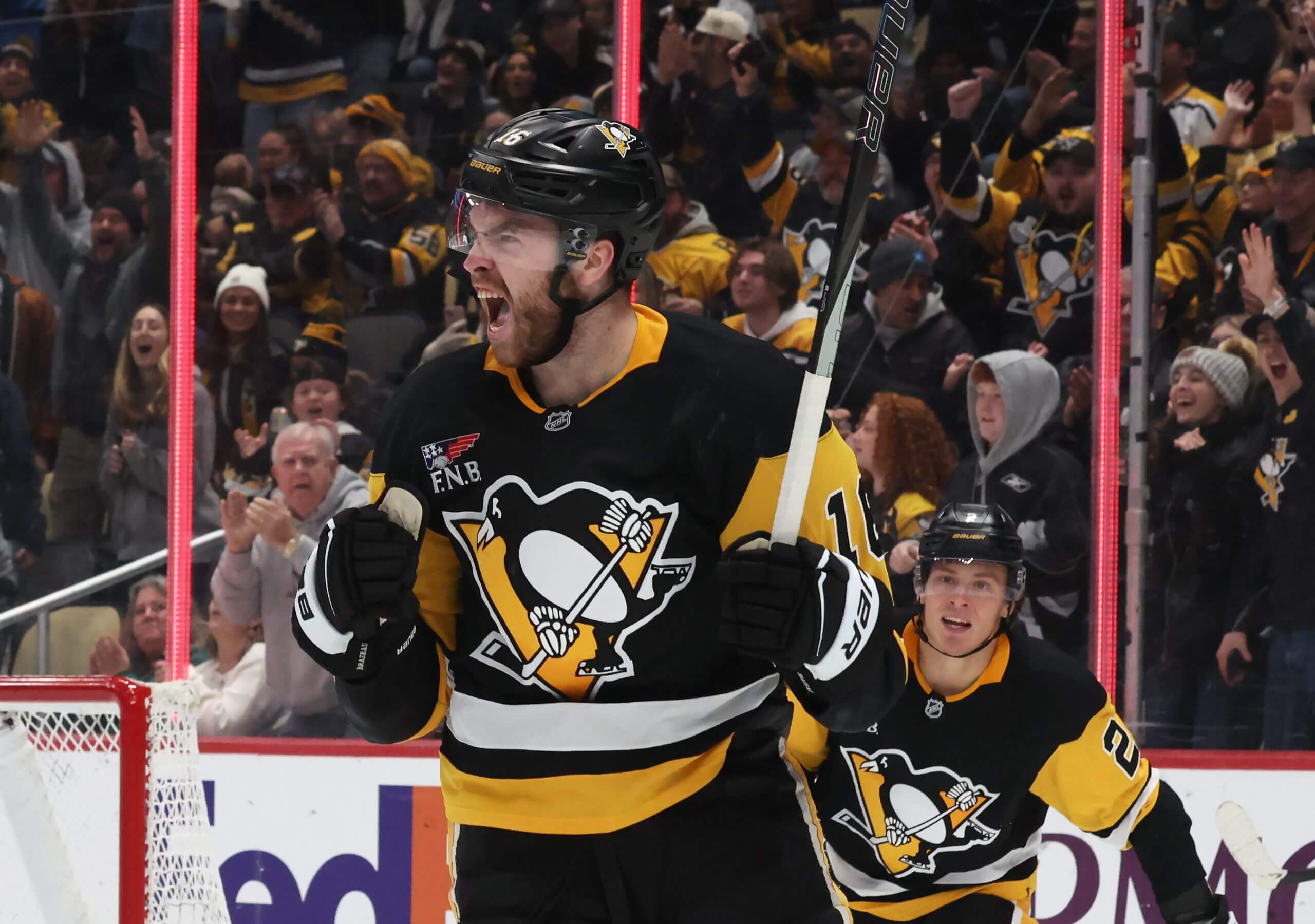 Justin Brazeau roars in triumph after scoring for the Penguins.
