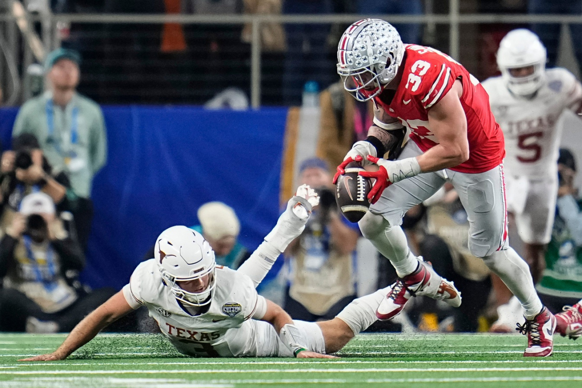 Ohio State Buckeyes defensive end Jack Sawyer (33) sacks Texas Longhorns quarterback Quinn Ewers (3) forcing a fumble during the second half of the Cotton Bowl Classic College Football Playoff semifinal game at AT&T Stadium in Arlington, Texas on Jan. 10, 2025. Sawyer returned the fumble for a touchdown, and Ohio State won 28-14. Ohio State Buckeyes defensive end Jack Sawyer (33) sacks Texas Longhorns quarterback Quinn Ewers (3) forcing a fumble during the second half of the Cotton Bowl Classic College Football Playoff semifinal game at AT&T Stadium in Arlington, Texas on Jan. 10, 2025. Sawyer returned the fumble for a touchdown, and Ohio State won 28-14.