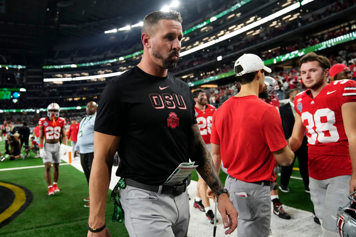 Ohio State Buckeyes offensive coordinator Brian Hartline leaves the field following the Cotton Bowl at AT&T Stadium in Arlington, Texas for the College Football Playoff quarterfinal game against the Miami Hurricanes on Dec. 31, 2025. Ohio State lost 24-14. Ohio State Buckeyes offensive coordinator Brian Hartline leaves the field following the Cotton Bowl at AT&T Stadium in Arlington, Texas for the College Football Playoff quarterfinal game against the Miami Hurricanes on Dec. 31, 2025. Ohio State lost 24-14.
