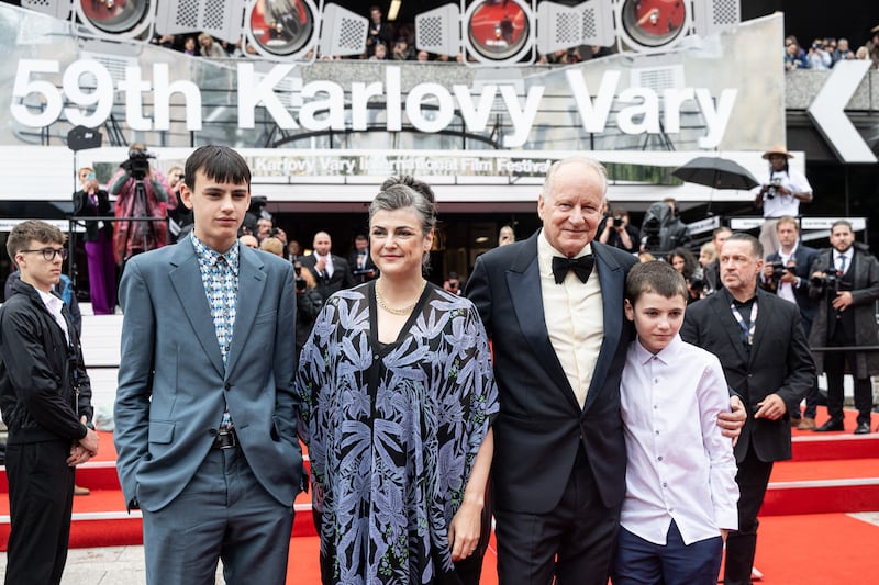 Swedish actor Stellan Skarsgard (2ndR) poses with wife Megan Everett and sons Ossian and Kolbjoern as they arrive for the closing ceremony of the 59th Karlovy Vary International Film Festival (KVIFF) in Karlovy Vary, Czech Republic on July 12, 2025. (Photo by Michal Cizek / AFP) (Photo by MICHAL CIZEK/AFP via Getty Images)