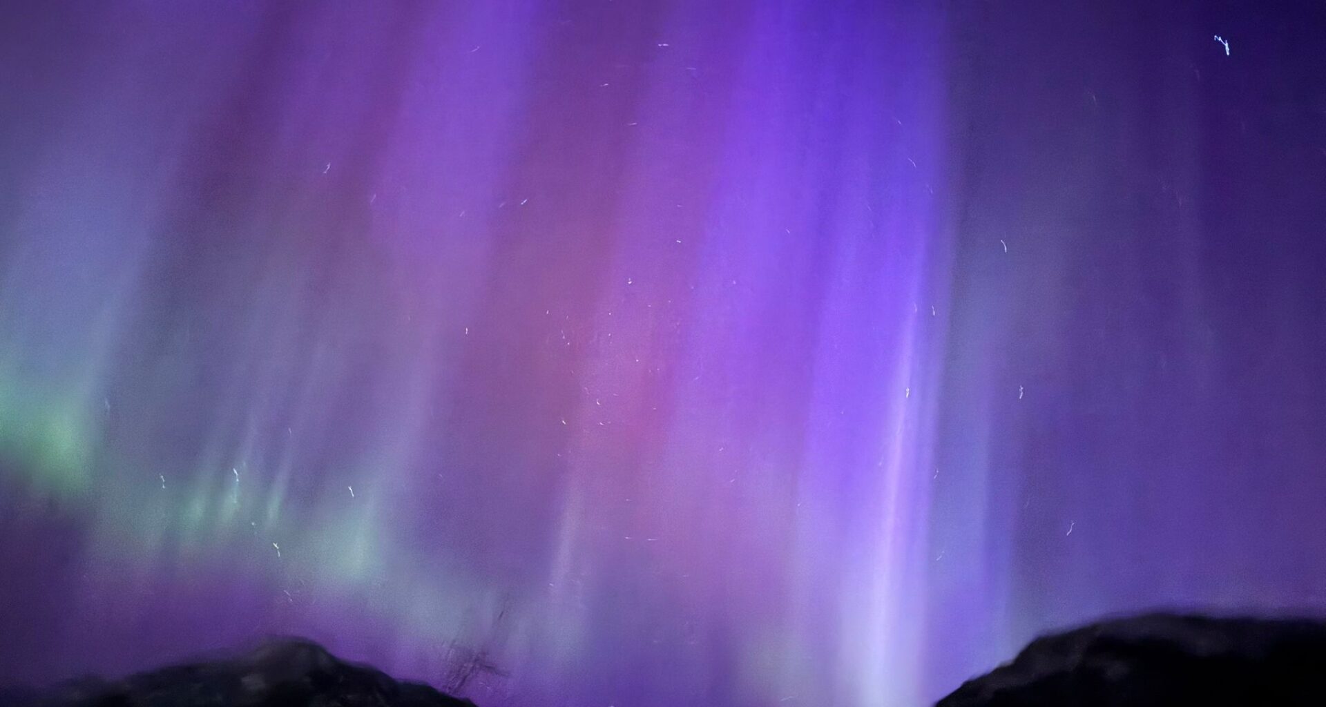 Purple, red and green aurora displays seen in the sky over Canada because of the solar storms