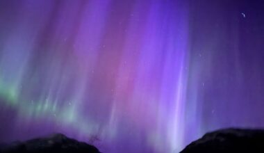 Purple, red and green aurora displays seen in the sky over Canada because of the solar storms