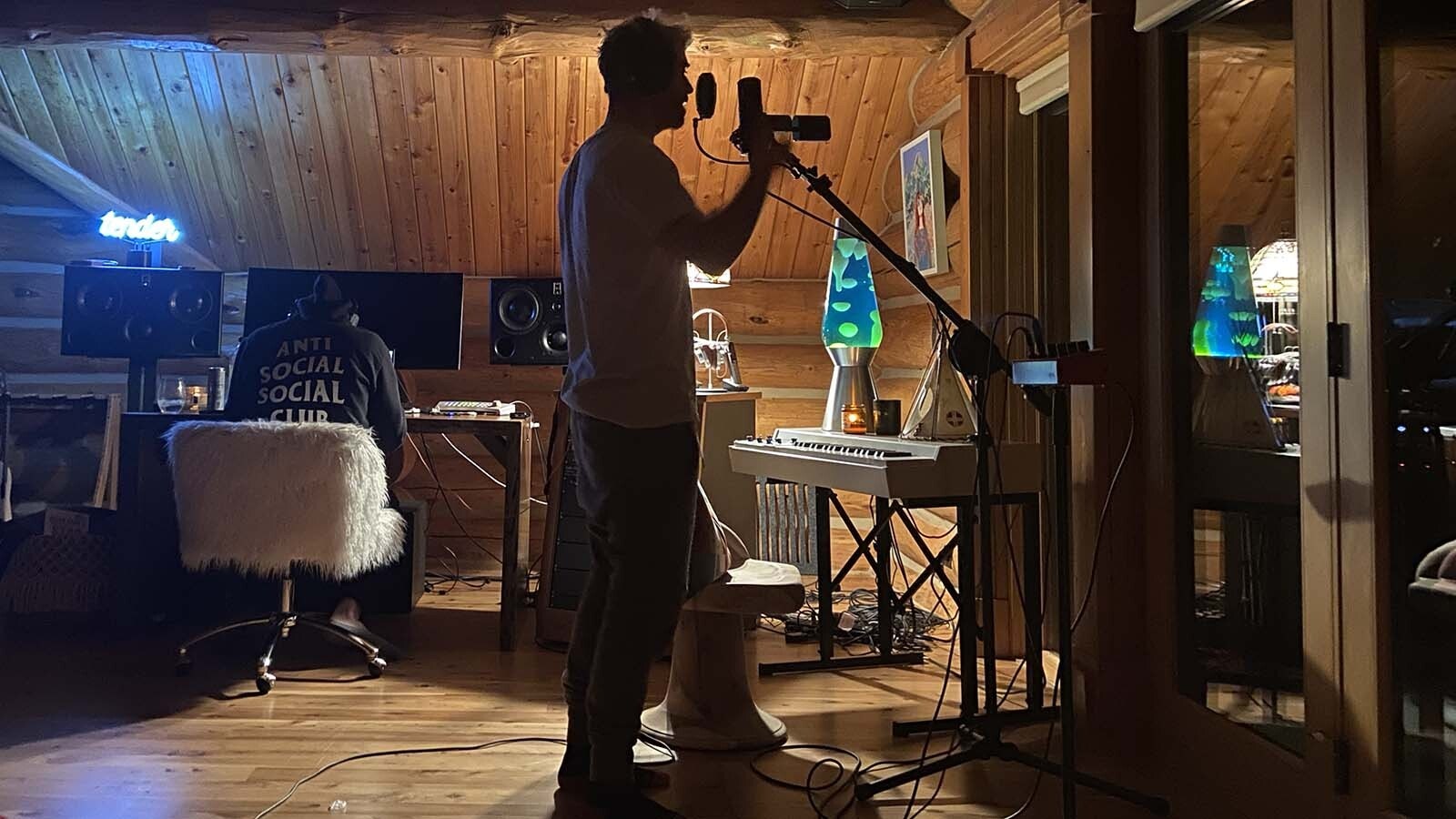 Drew Taggert with The Chainsmokers in Emily Warren's Wilson, Wyoming, cabin which has also been a songwriting studio. Warren won a Grammy as a co-writer of The Chainsmokers' hit "Don't Let Me Down."