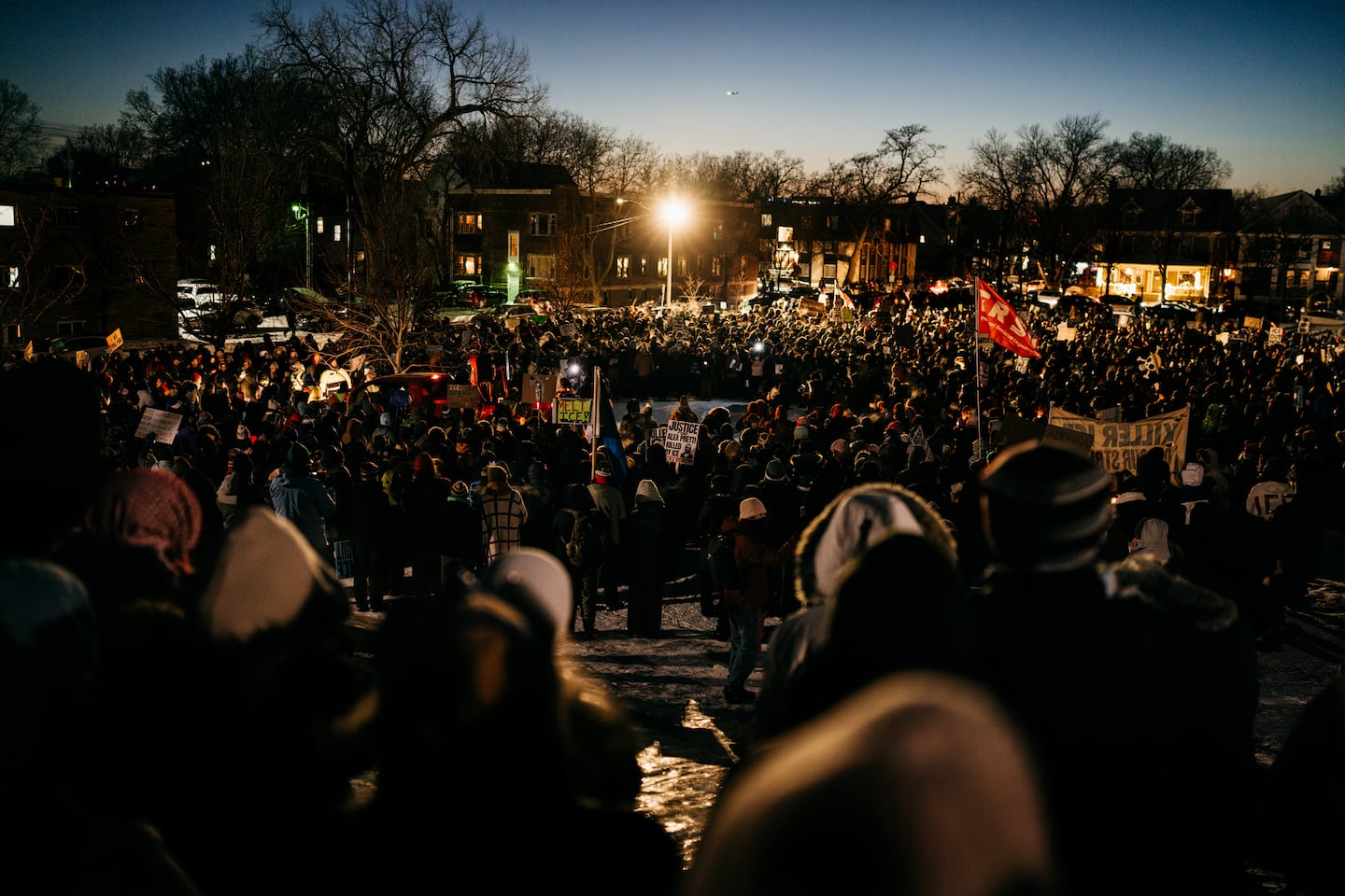 Mourners gather at a vigil for Alex Pretti, who was shot and killed by federal immigration agents, in Minneapolis.