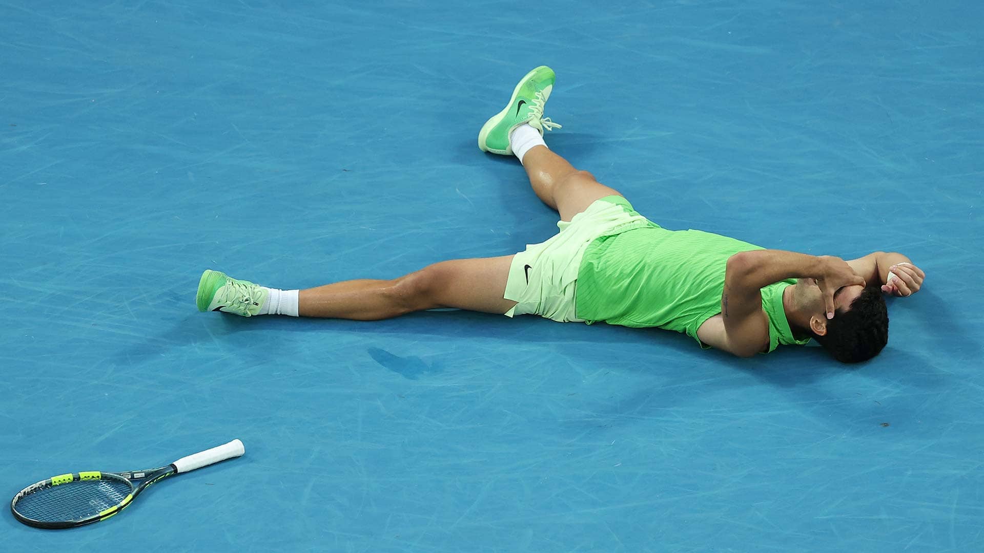 Carlos Alcaraz celebrates after defeating Alexander Zverev in the longest Australian Open semi-final in history.