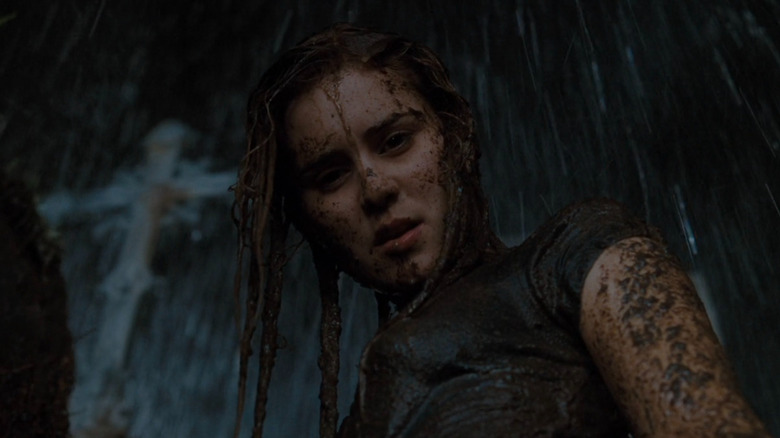 Christine Brown covered in mud in 