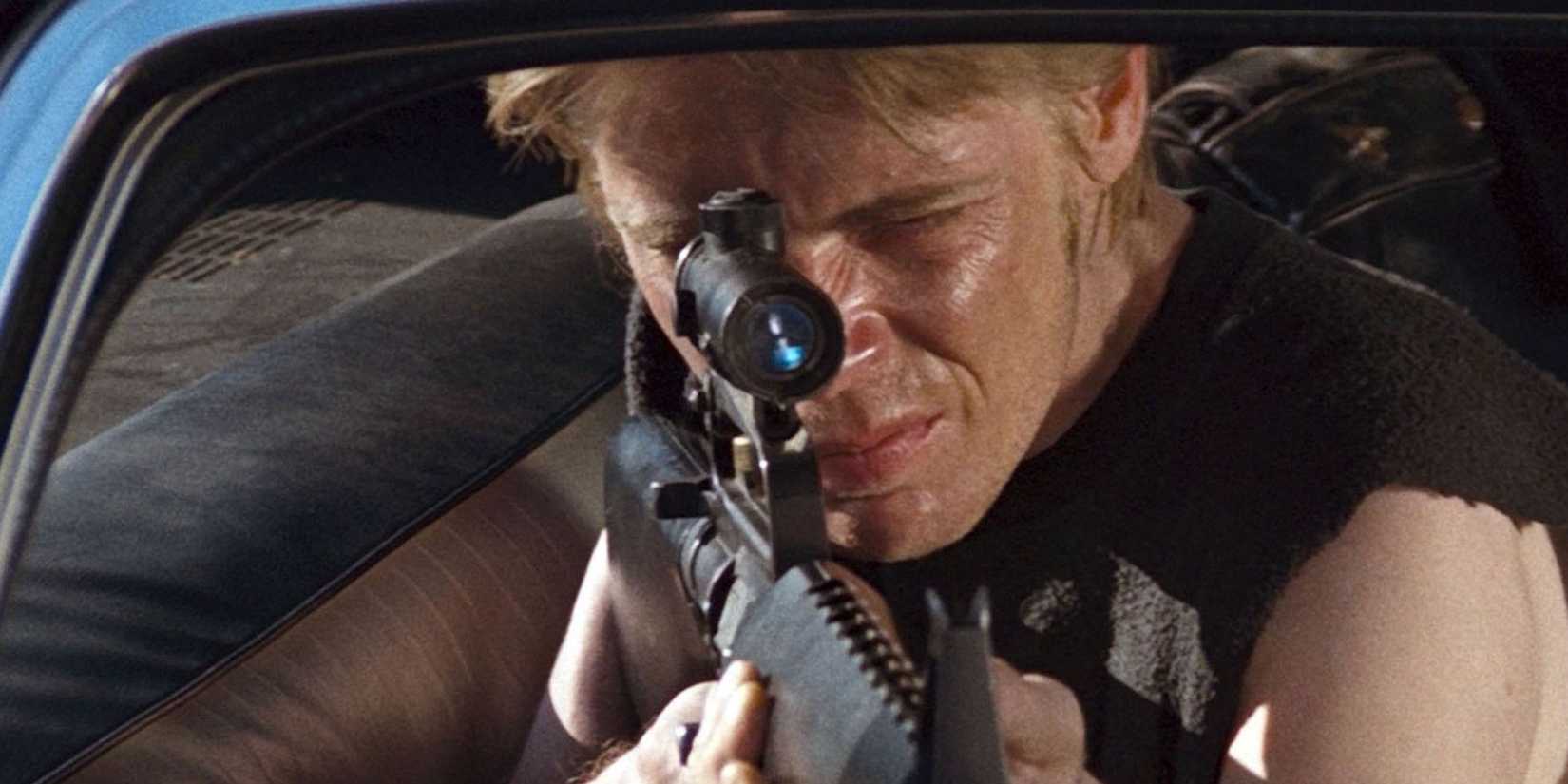 A man aiming a sniper rifle in Assault on Precinct 13