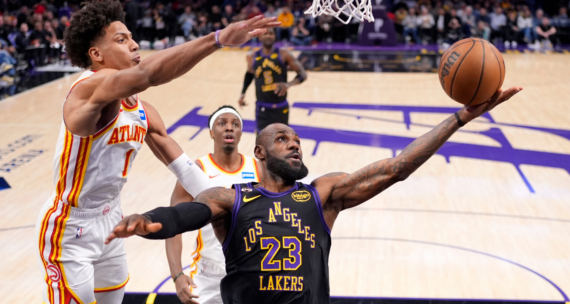 LeBron barely misses triple-double, Luka adds 27 in Lakers' skid-snapping 141-116 win over Hawks