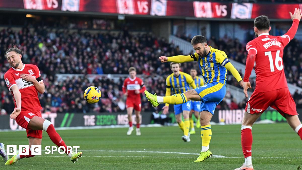 Luke Littler celebrates winning the 2026 PDC World Championship as tickertape falls