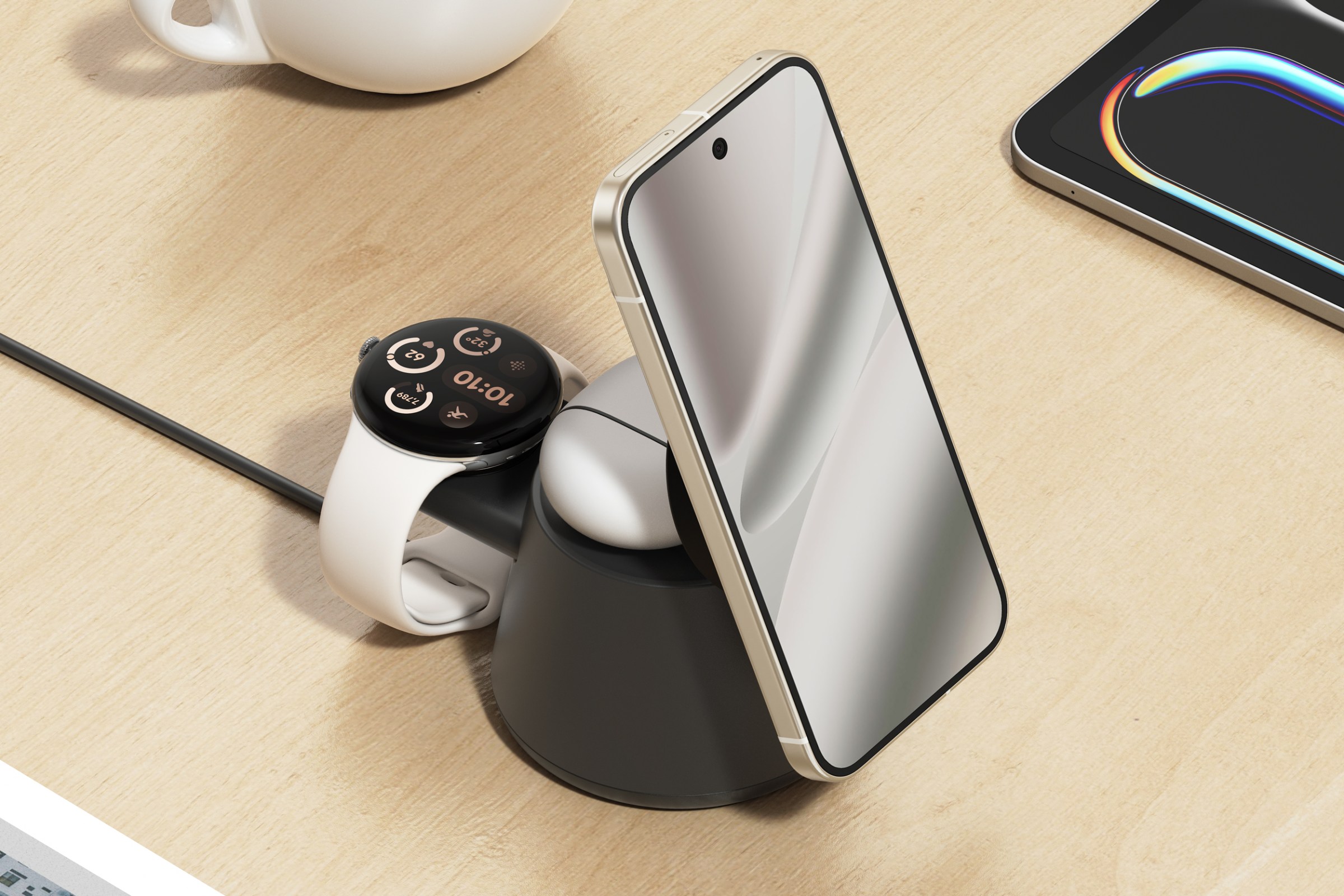 Belkin’s UltraCharge Modular Charging Dock charging a phone, smartwatch, and earbuds.